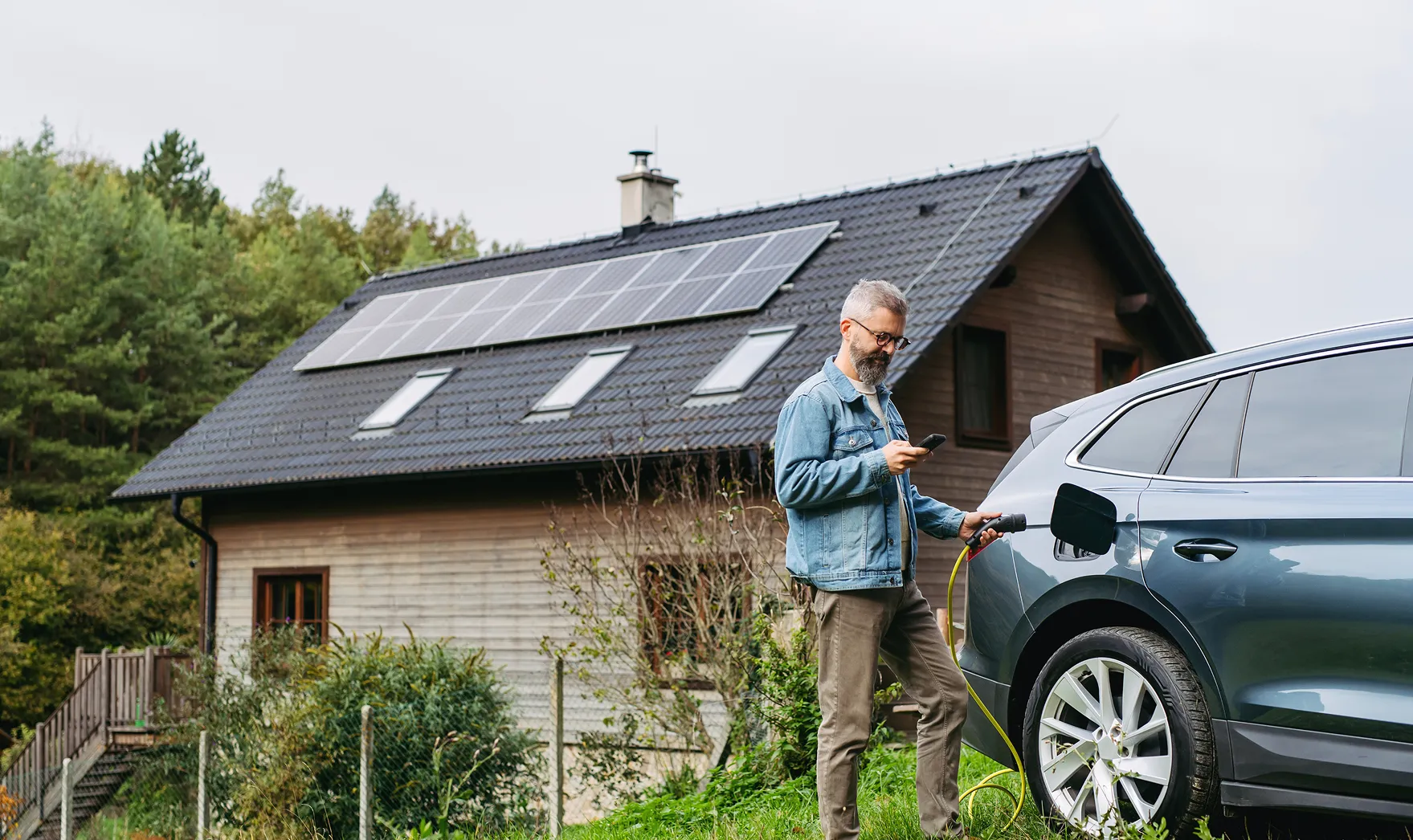 Man charging electric car